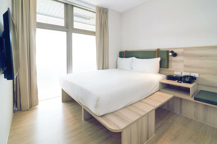 Imagen de la habitación del Hotel CHECKinn Express New Taipei Tamsui. Foto 28