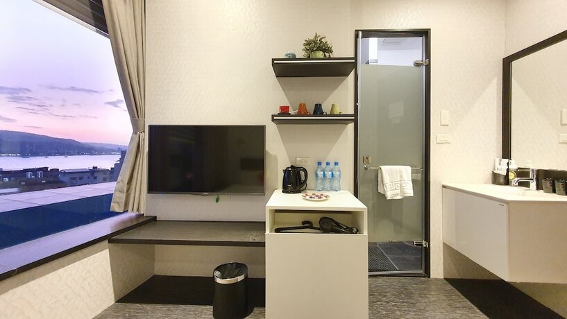 Imagen de la habitación del Hotel CHECKinn Express New Taipei Tamsui. Foto 31