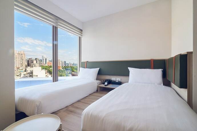 Imagen de la habitación del Hotel CHECKinn Express New Taipei Tamsui. Foto 33