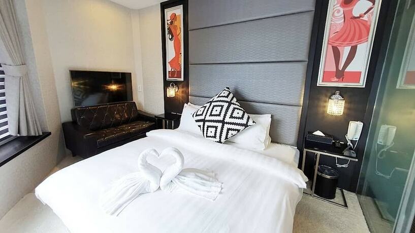 Imagen de la habitación del Hotel CHECKinn Express New Taipei Tamsui. Foto 34