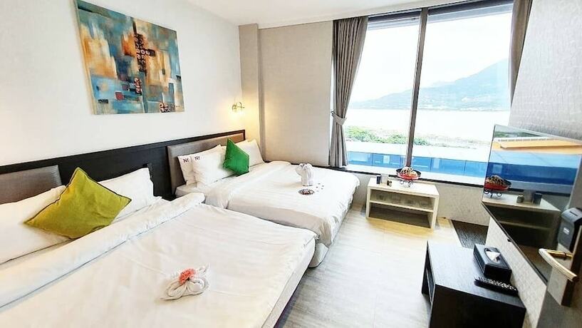 Imagen de la habitación del Hotel CHECKinn Express New Taipei Tamsui. Foto 36