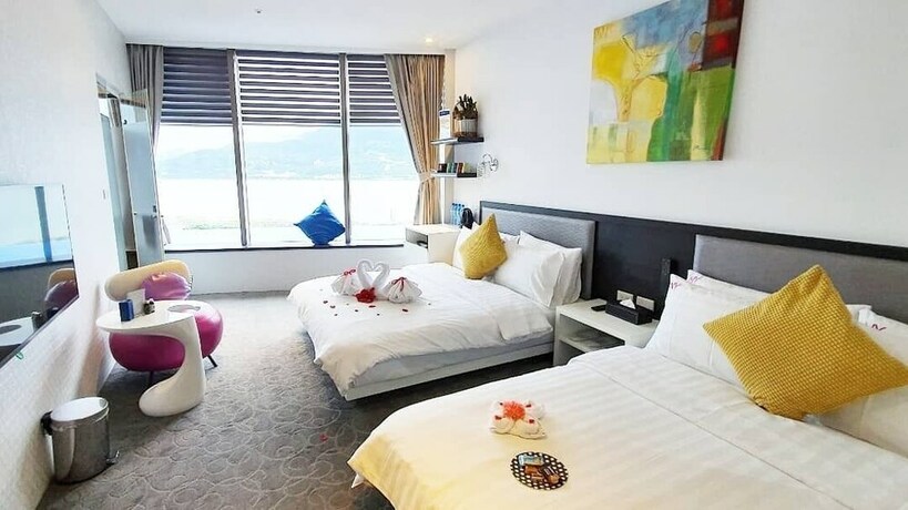 Imagen de la habitación del Hotel CHECKinn Express New Taipei Tamsui. Foto 37