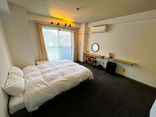 Imagen de la habitación del Hotel CHENDA INTERNATIONAL HOTEL. Foto 14