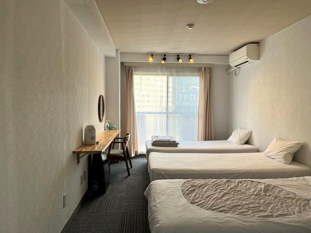 Imagen de la habitación del Hotel CHENDA INTERNATIONAL HOTEL. Foto 15
