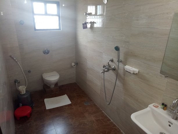 Imagen de la habitación del Hotel CHINMAYE INN. Foto 4