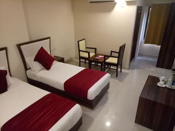 Imagen de la habitación del Hotel CHINMAYE INN. Foto 11