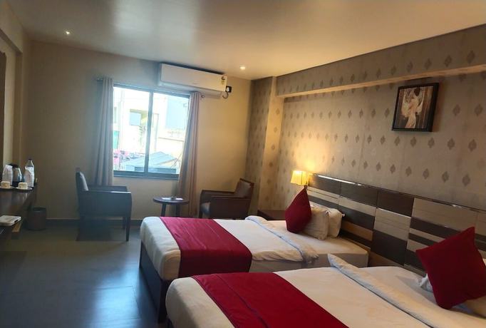 Imagen de la habitación del Hotel CHINMAYE INN. Foto 12