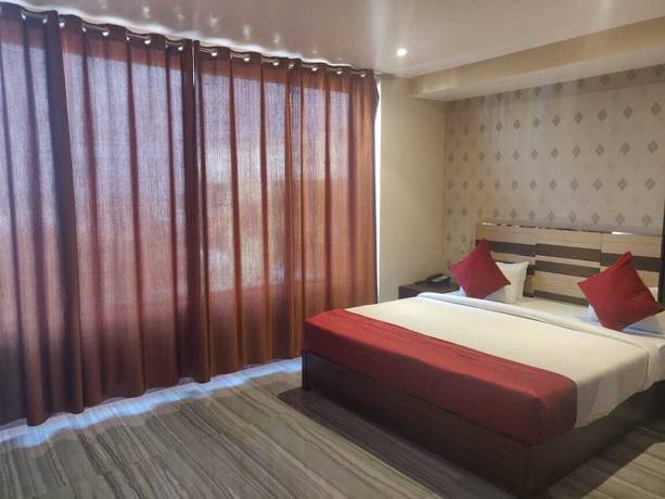 Imagen de la habitación del Hotel CHINMAYE INN. Foto 14