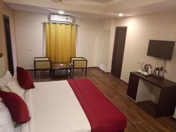 Imagen de la habitación del Hotel CHINMAYE INN. Foto 17