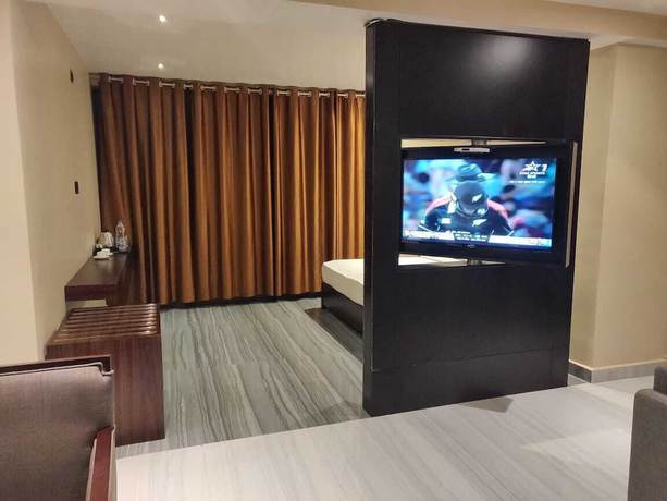 Imagen de la habitación del Hotel CHINMAYE INN. Foto 18