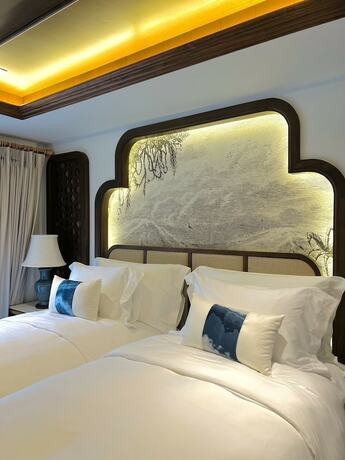 Imagen de la habitación del Hotel CHINO at Nimman Luxury Boutique. Foto 13