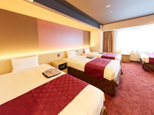 Imagen de la habitación del Hotel CHISUN PREMIUM Kyoto Kujo. Foto 18