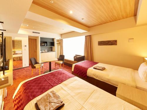 Imagen de la habitación del Hotel CHISUN PREMIUM Kyoto Kujo. Foto 19