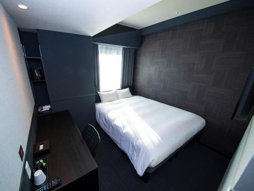 Imagen de la habitación del Hotel CHISUN STANDARD Osaka Shin-Imamiya. Foto 9
