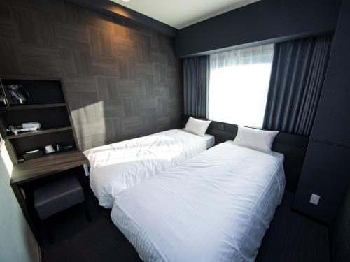 Imagen de la habitación del Hotel CHISUN STANDARD Osaka Shin-Imamiya. Foto 10
