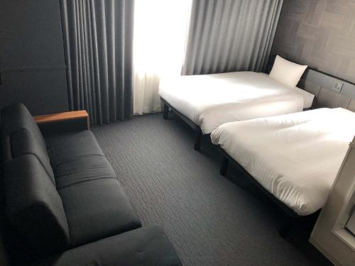 Imagen de la habitación del Hotel CHISUN STANDARD Osaka Shin-Imamiya. Foto 12
