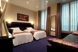 Imagen de la habitación del Hotel CHOISEUL OPERA HOTEL. Foto 7