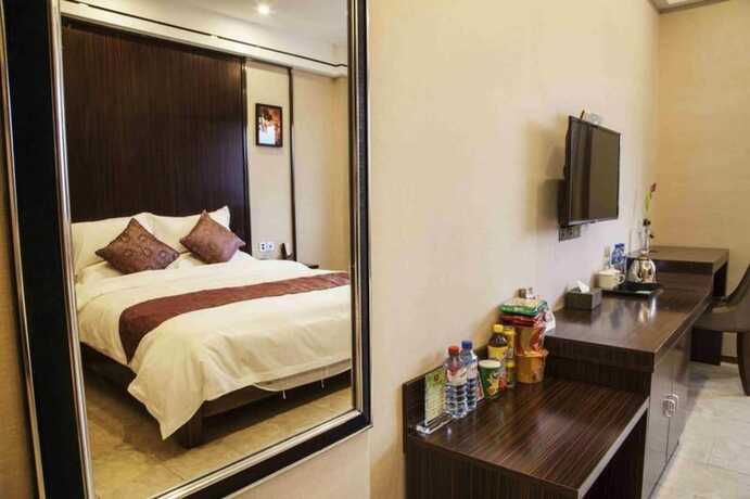 Imagen de la habitación del Hotel CHONPINES HOTEL ANSHUN TAIXIANG BAILI. Foto 3