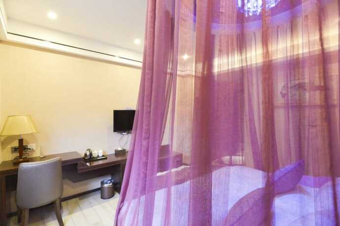 Imagen de la habitación del Hotel CHONPINES HOTEL ANSHUN TAIXIANG BAILI. Foto 4