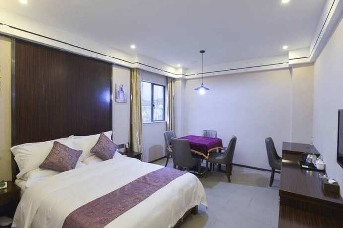 Imagen de la habitación del Hotel CHONPINES HOTEL ANSHUN TAIXIANG BAILI. Foto 5