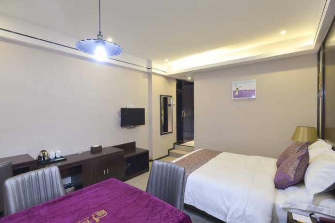 Imagen de la habitación del Hotel CHONPINES HOTEL ANSHUN TAIXIANG BAILI. Foto 8