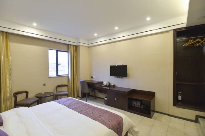 Imagen de la habitación del Hotel CHONPINES HOTEL ANSHUN TAIXIANG BAILI. Foto 9