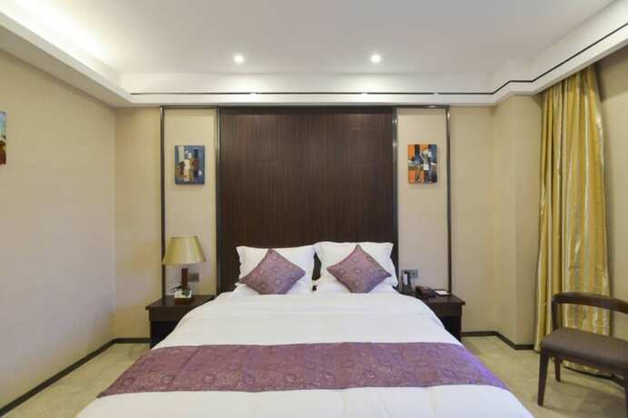 Imagen de la habitación del Hotel CHONPINES HOTEL ANSHUN TAIXIANG BAILI. Foto 11