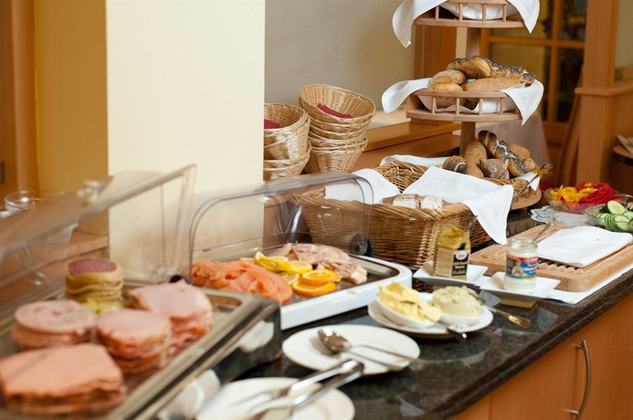 Imagen del bar/restaurante del Hotel CHRIZZ Rooms. Foto 3