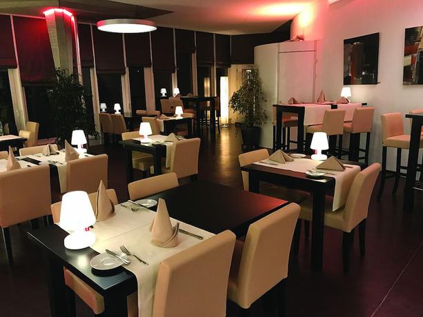 Imagen del bar/restaurante del Hotel CIP, Tramelan. Foto 3