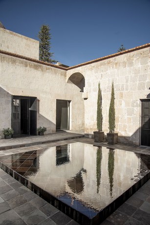 Imagen de la habitación del Hotel CIRQA - Relais and Ch&acirc;teaux. Foto 5