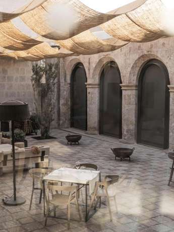 Imagen de la habitación del Hotel CIRQA - Relais and Ch&acirc;teaux. Foto 9