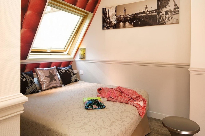 Imagen de la habitación del Hotel CITE ROUGEMONT. Foto 9