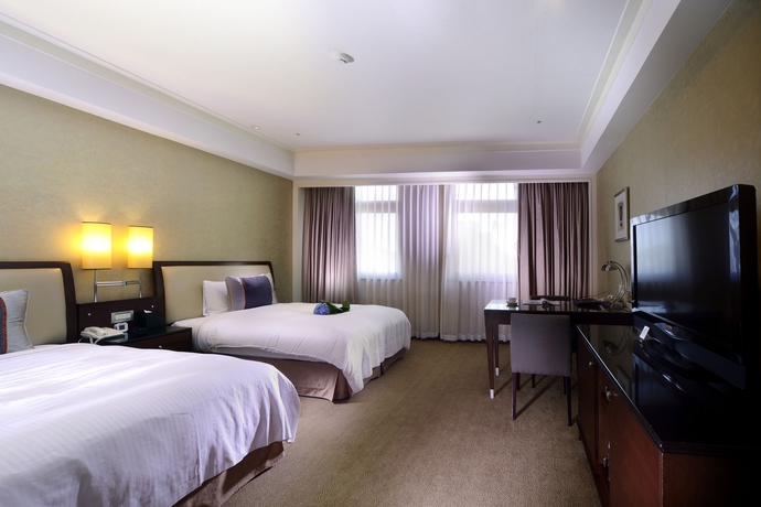 Imagen de la habitación del Hotel CITY LAKE HOTEL (DELUXE ROOM). Foto 7