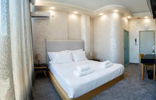 Imagen de la habitación del Hotel CITY Petrich. Foto 18