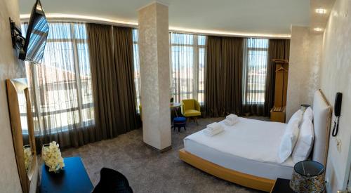Imagen de la habitación del Hotel CITY Petrich. Foto 19