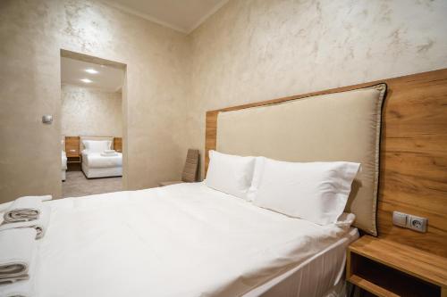 Imagen de la habitación del Hotel CITY Sandanski. Foto 18