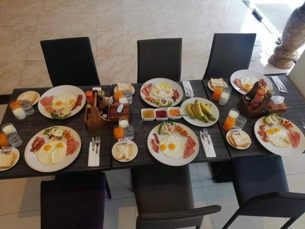Imagen del bar/restaurante del Hotel CITYVIEW RESIDENCE. Foto 7