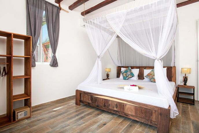 Imagen de la habitación del Hotel CInnamon. Foto 16