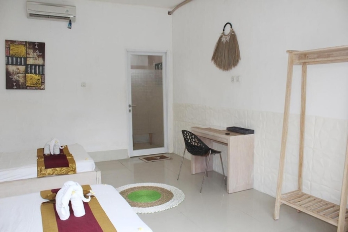 Imagen de la habitación del Hotel CJ\'s House Trawangan. Foto 12
