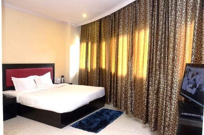 Imagen de la habitación del Hotel CK International. Foto 12