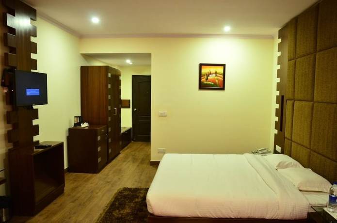 Imagen de la habitación del Hotel CK International. Foto 14