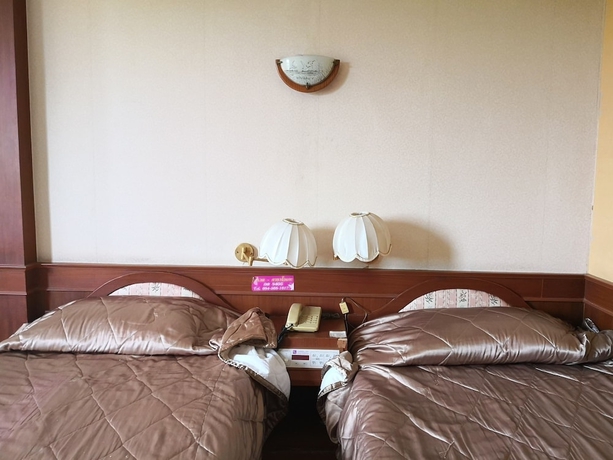 Imagen de la habitación del Hotel CL Garden Inn. Foto 6