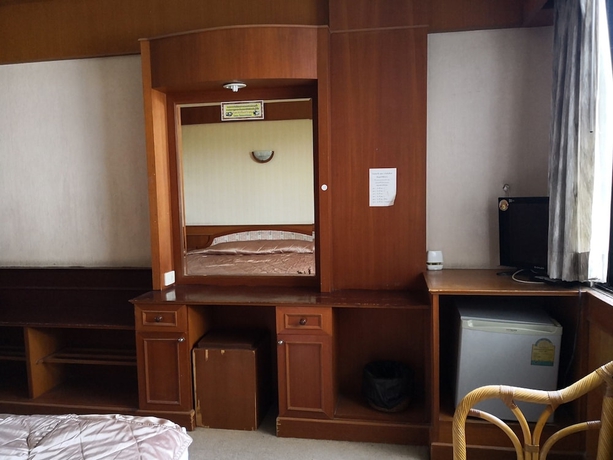 Imagen de la habitación del Hotel CL Garden Inn. Foto 9