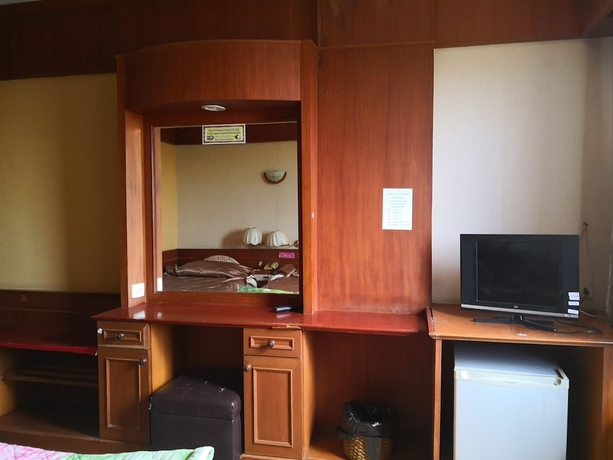 Imagen de la habitación del Hotel CL Garden Inn. Foto 12