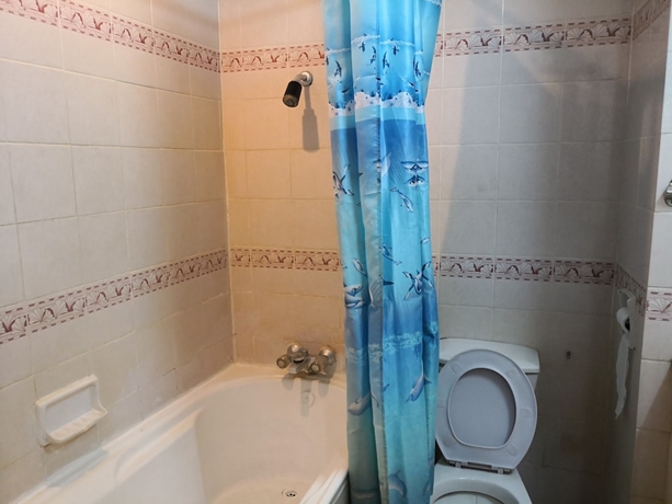 Imagen de la habitación del Hotel CL Garden Inn. Foto 13