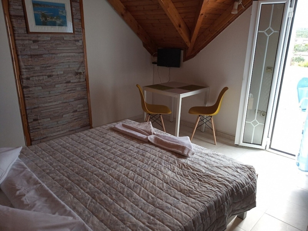 Imagen de la habitación del Hotel CLEAR HORIZON, Ammoudi. Foto 11
