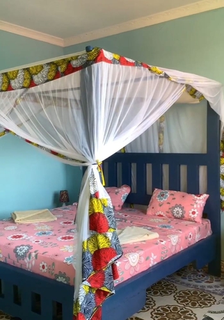 Imagen de la habitación del Hotel COCCOBELLO ZANZIBAR. Foto 8