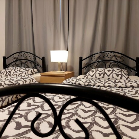 Imagen de la habitación del Hotel COCO Guesthouse. Foto 20