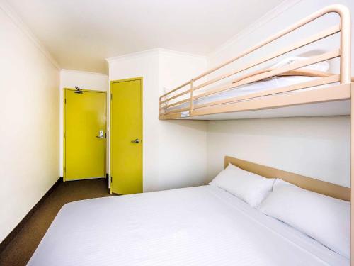 Imagen de la habitación del Hotel COFFS HARBOUR BUDGET STAY. Foto 7