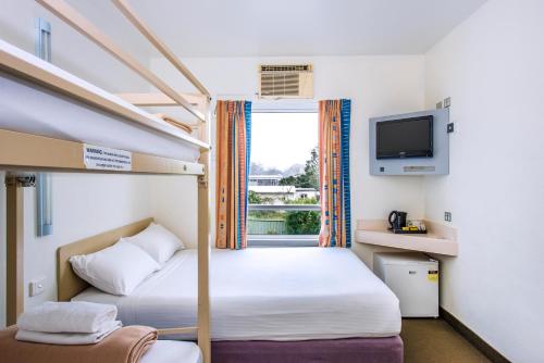 Imagen de la habitación del Hotel COFFS HARBOUR BUDGET STAY. Foto 8